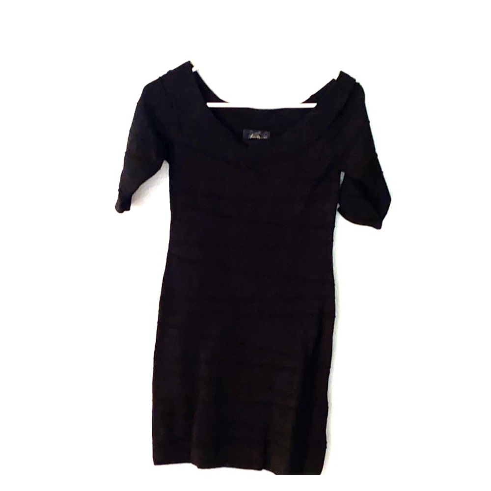 Women’s black stretch dress.